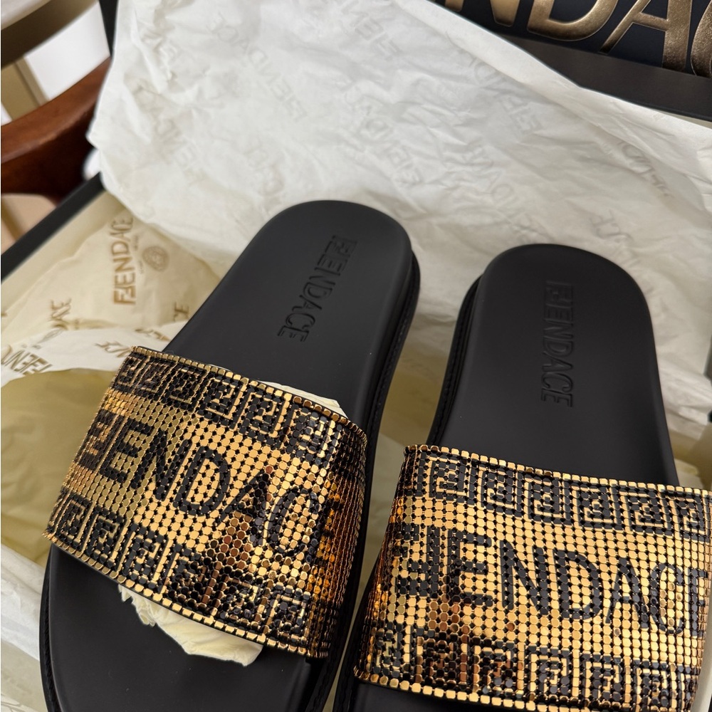 Black and Gold Sandals with Elegant Design